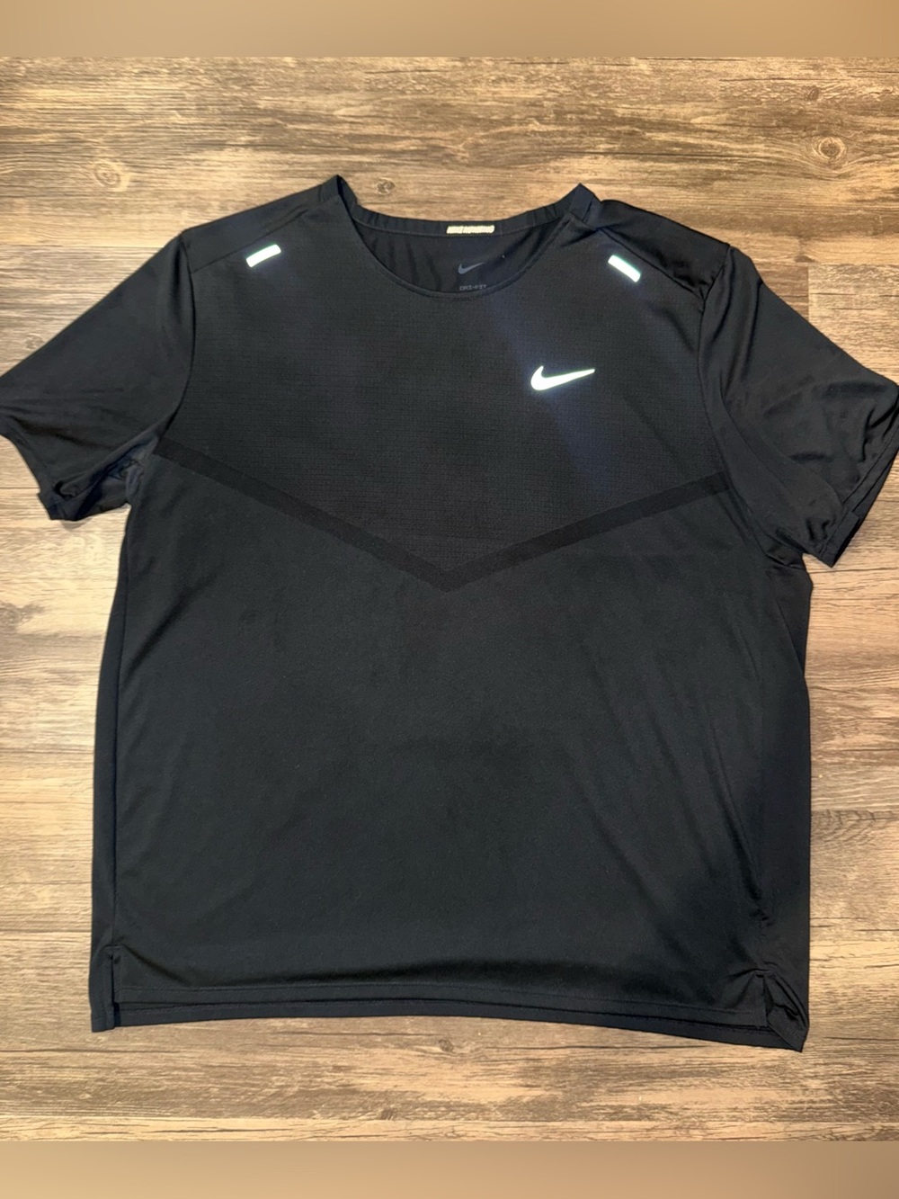 Nike Black Short-Sleeve Athletic Tee with Reflective Swoosh